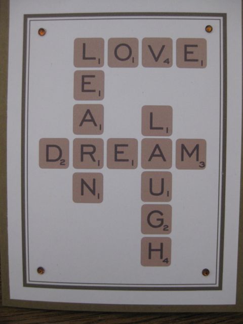 Scrabble/love/learn/dream/laugh