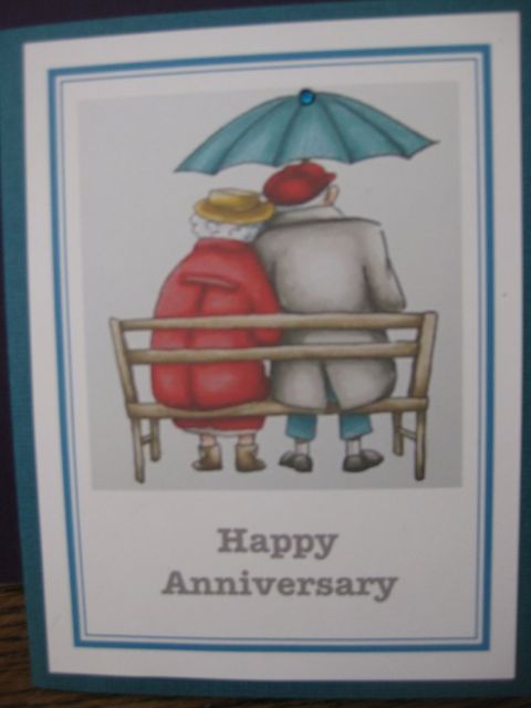 old couple/umbrellaa