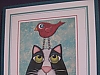 Cat w/red bird